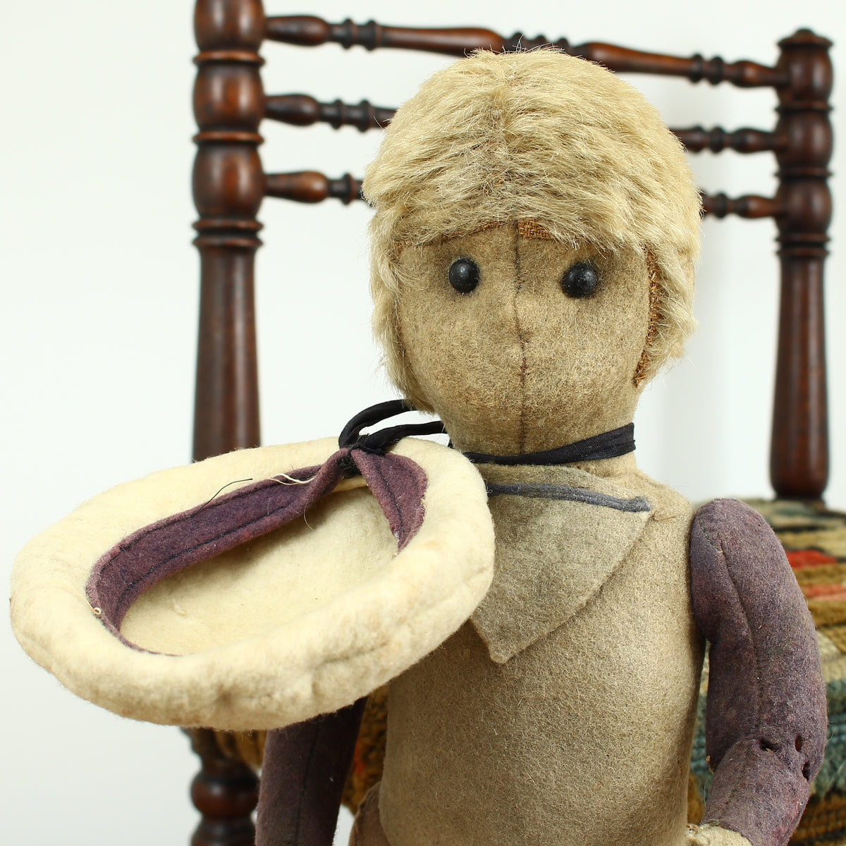 Toys & Juvenalia - an early 20th century straw-filled felt and mohair sailor doll, in the Steiff style