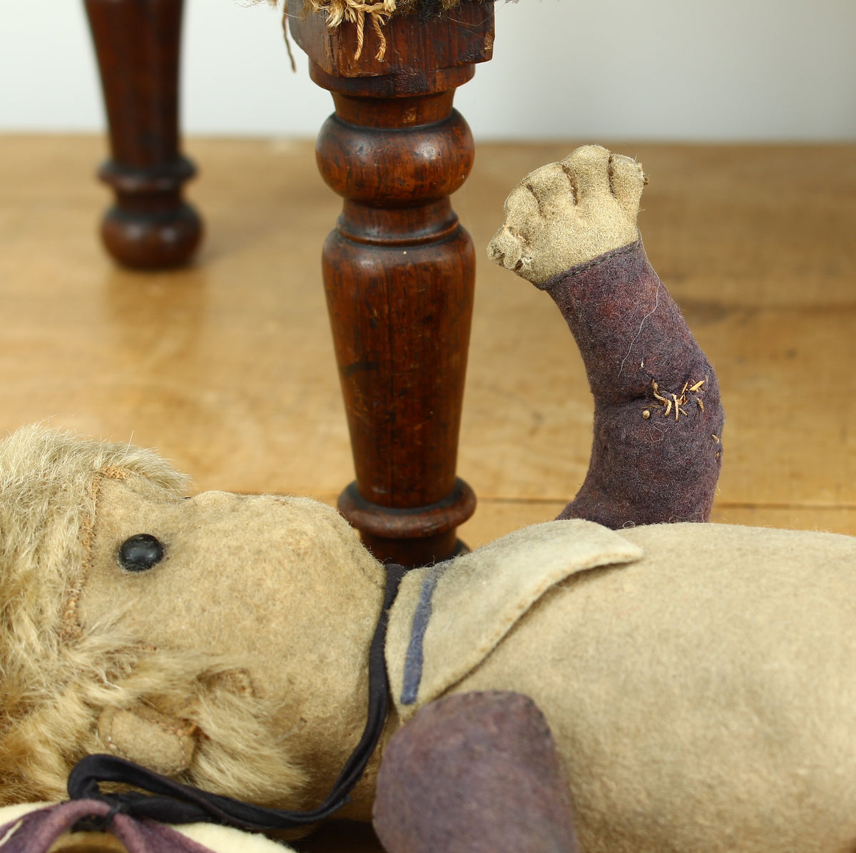 Toys & Juvenalia - an early 20th century straw-filled felt and mohair sailor doll, in the Steiff style
