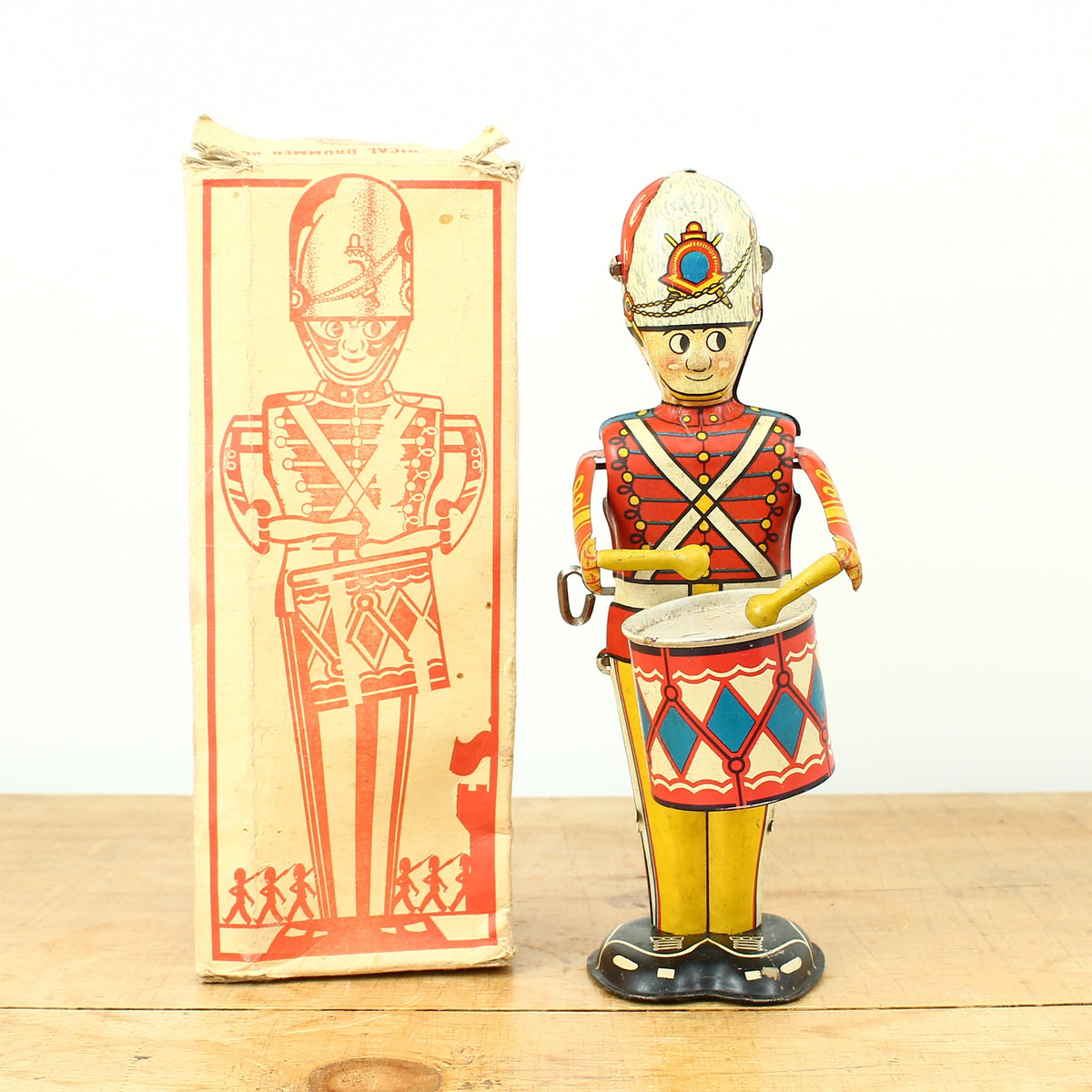 Toys & Juvenalia - a 1940's Louis Marx & Co. Ltd., Swansea, tinplate and clockwork mechanical drummer boy toy, boxed