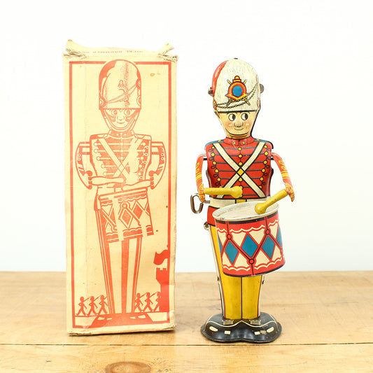 Toys & Juvenalia - a 1940's Louis Marx & Co. Ltd., Swansea, tinplate and clockwork mechanical drummer boy toy, boxed
