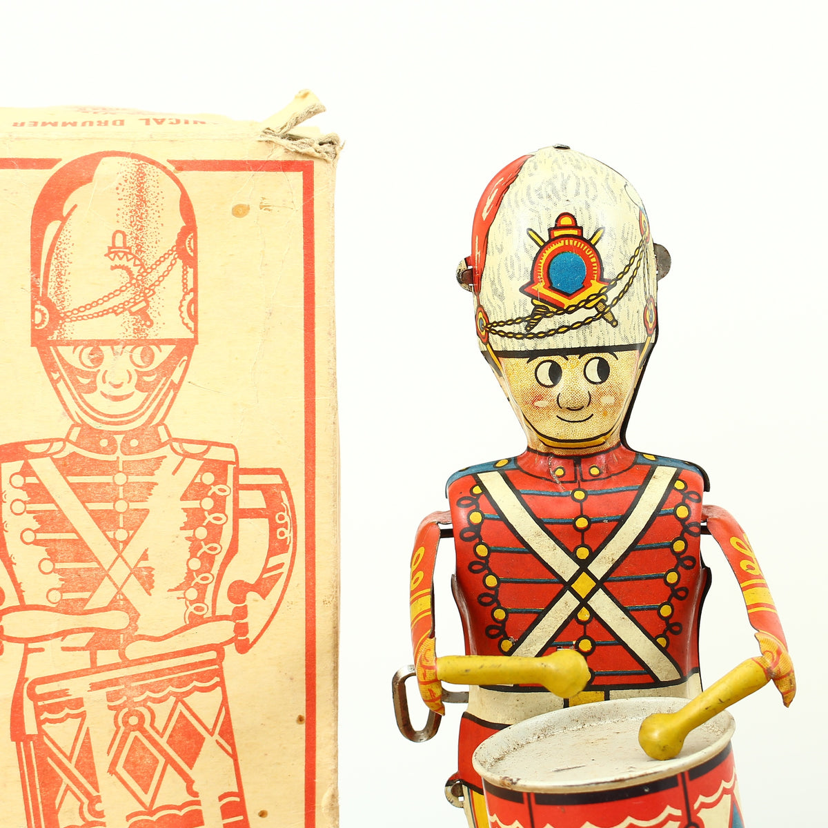 Toys & Juvenalia - a 1940's Louis Marx & Co. Ltd., Swansea, tinplate and clockwork mechanical drummer boy toy, boxed