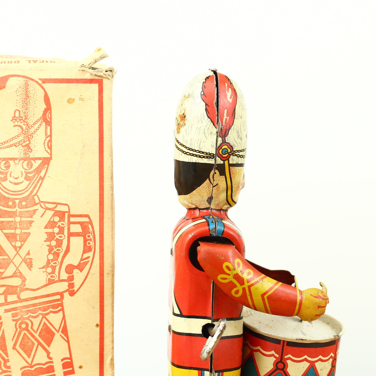 Toys & Juvenalia - a 1940's Louis Marx & Co. Ltd., Swansea, tinplate and clockwork mechanical drummer boy toy, boxed