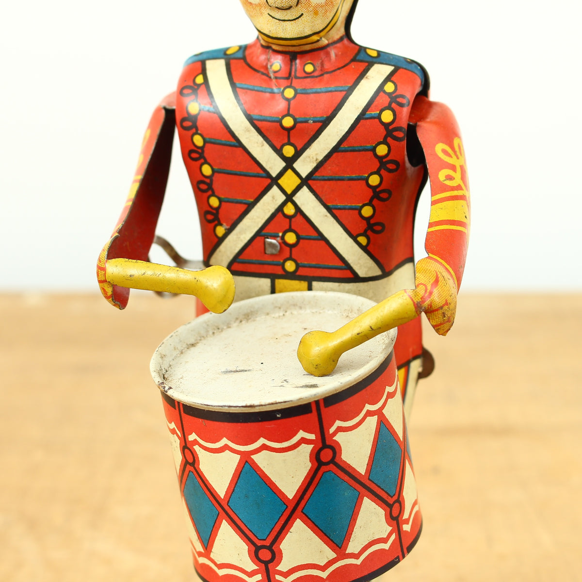 Toys & Juvenalia - a 1940's Louis Marx & Co. Ltd., Swansea, tinplate and clockwork mechanical drummer boy toy, boxed
