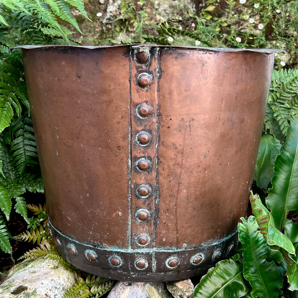 A late 19th century/early 20th century riveted copper boiler or country house fuel bin