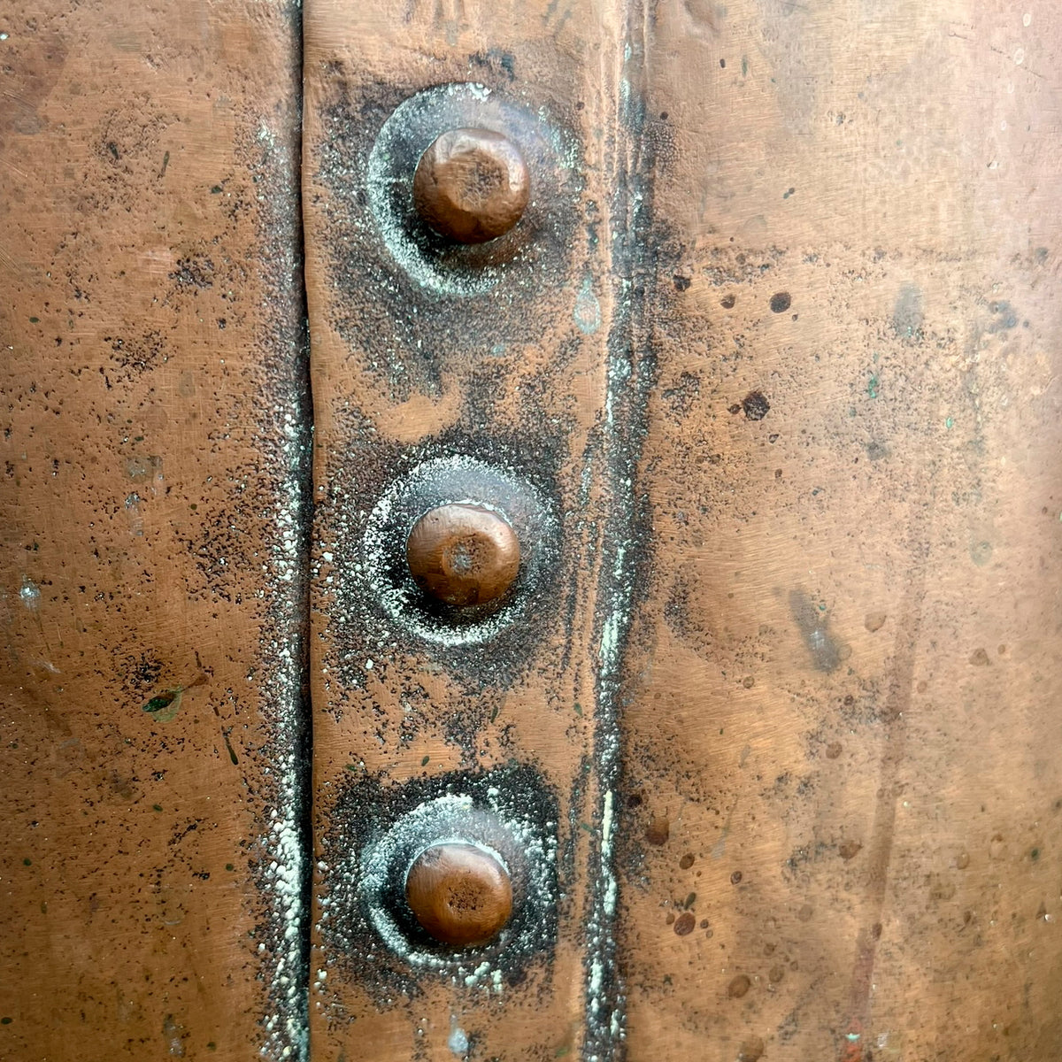 A late 19th century/early 20th century riveted copper boiler or country house fuel bin