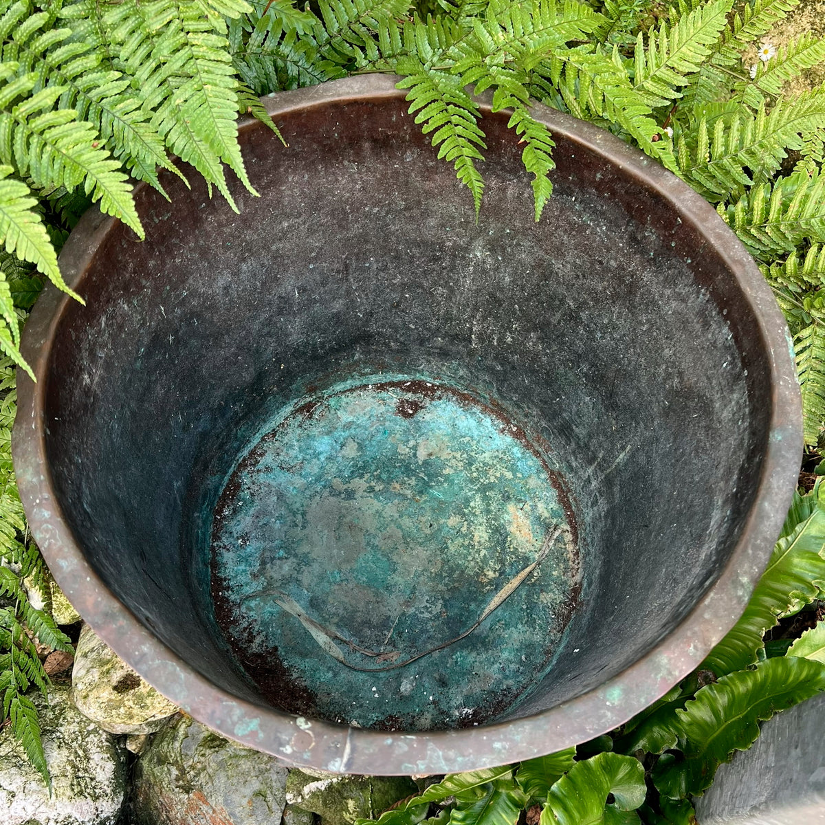 A late 19th century/early 20th century riveted copper boiler or country house fuel bin