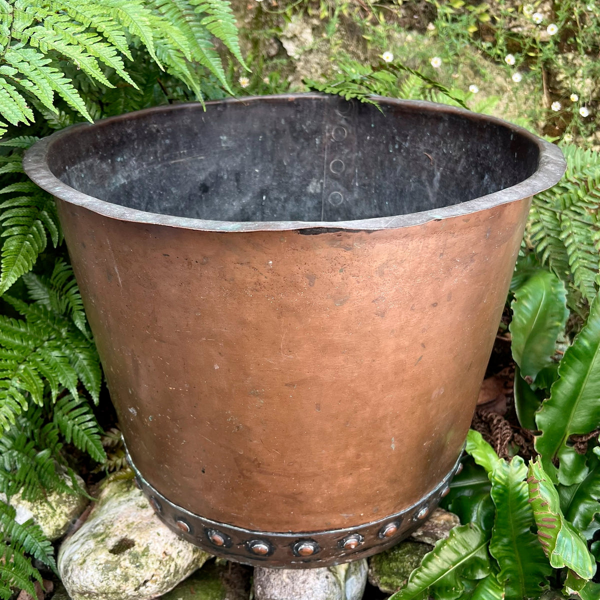 A late 19th century/early 20th century riveted copper boiler or country house fuel bin