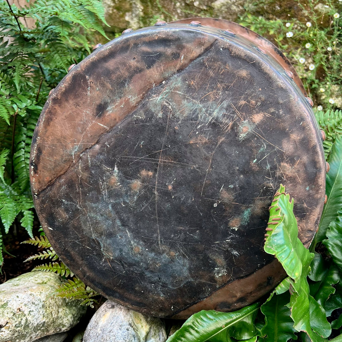 A late 19th century/early 20th century riveted copper boiler or country house fuel bin
