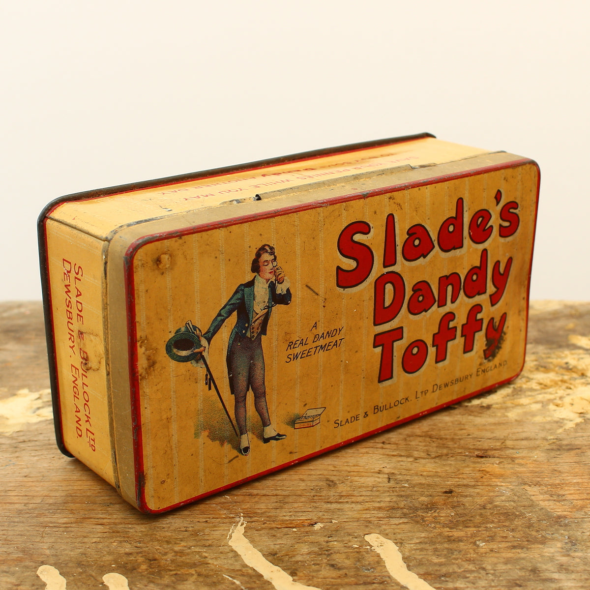 Advertising - a Slade & Bullock Ltd rounded rectangular shaped pictorial advertising tin
