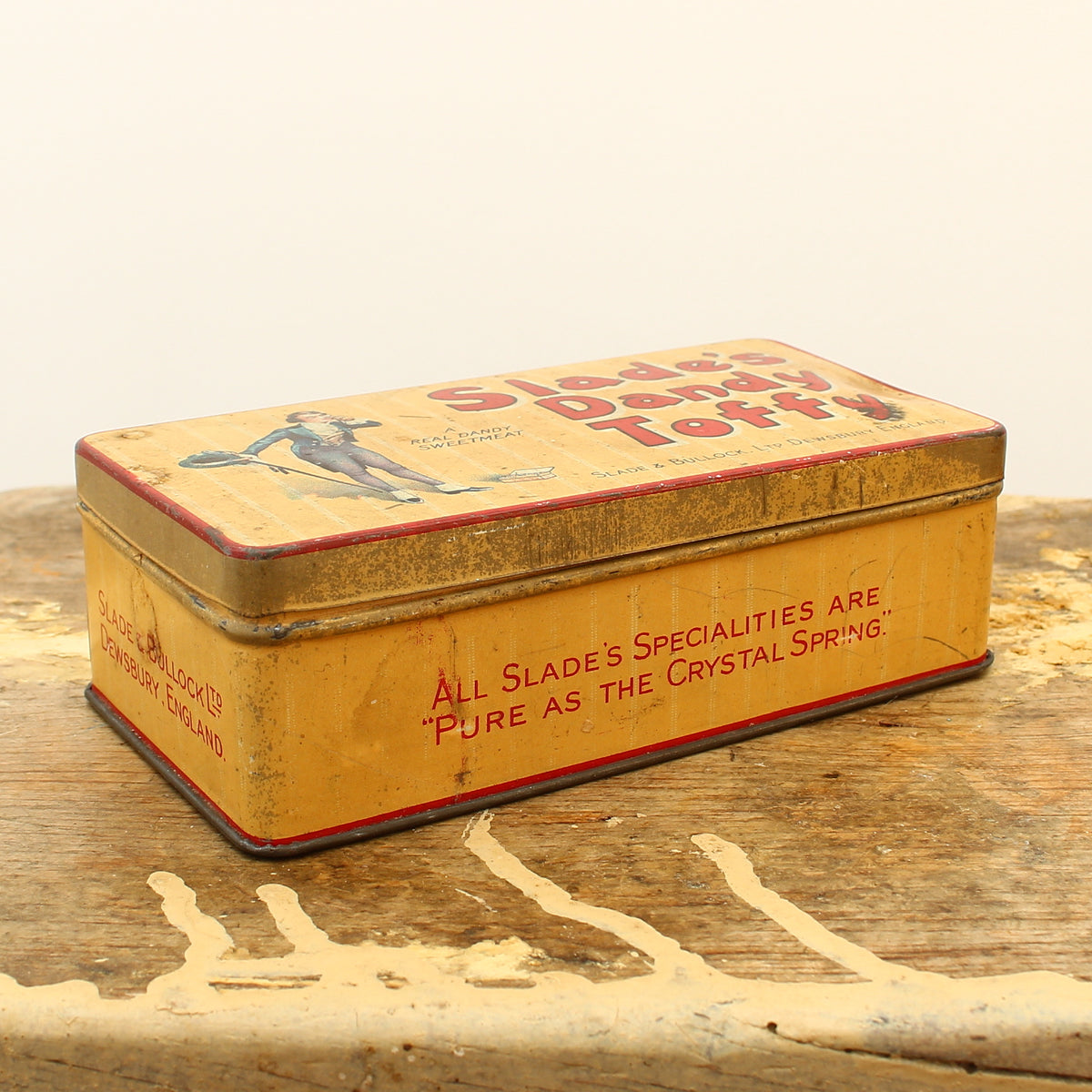 Advertising - a Slade & Bullock Ltd rounded rectangular shaped pictorial advertising tin