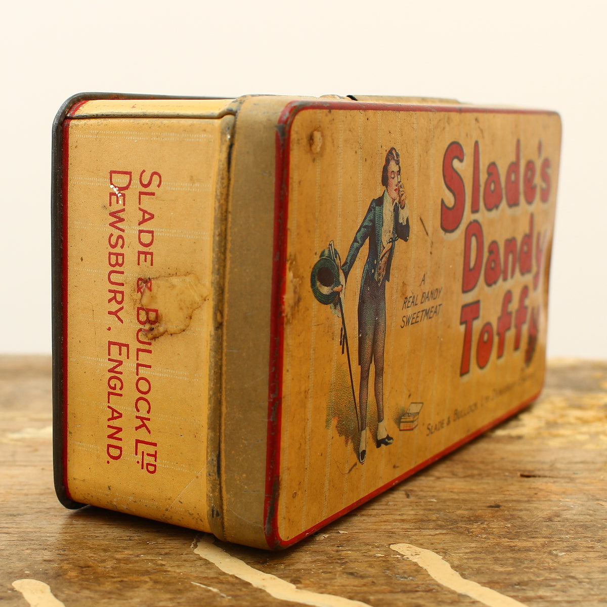 Advertising - a Slade & Bullock Ltd rounded rectangular shaped pictorial advertising tin
