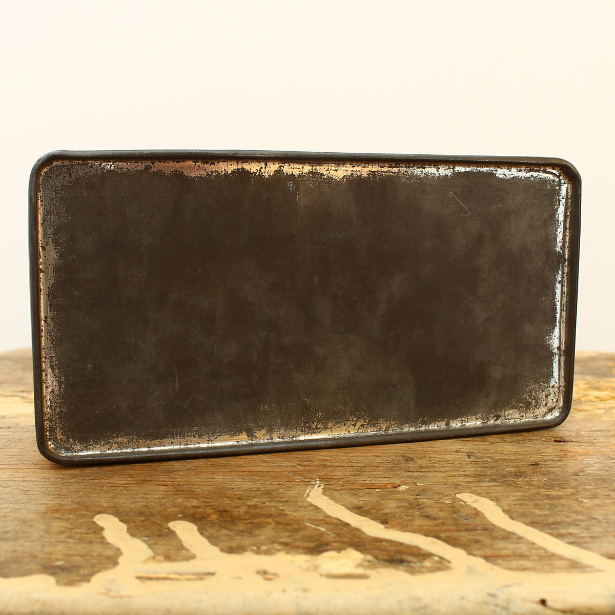 Advertising - a Slade & Bullock Ltd rounded rectangular shaped pictorial advertising tin