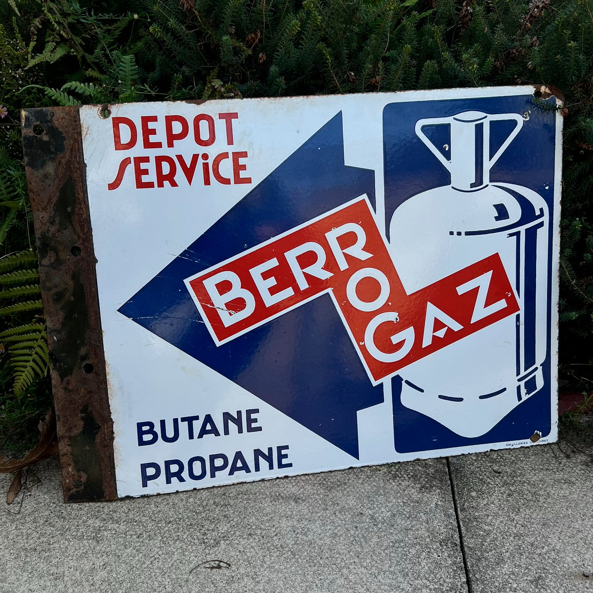 Advertising - a French double sided pictorial flanged enamel advertising sign, Berrogaz