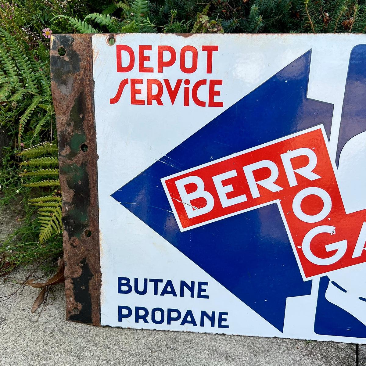 Advertising - a French double sided pictorial flanged enamel advertising sign, Berrogaz