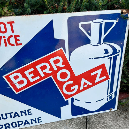 Advertising - a French double sided pictorial flanged enamel advertising sign, Berrogaz