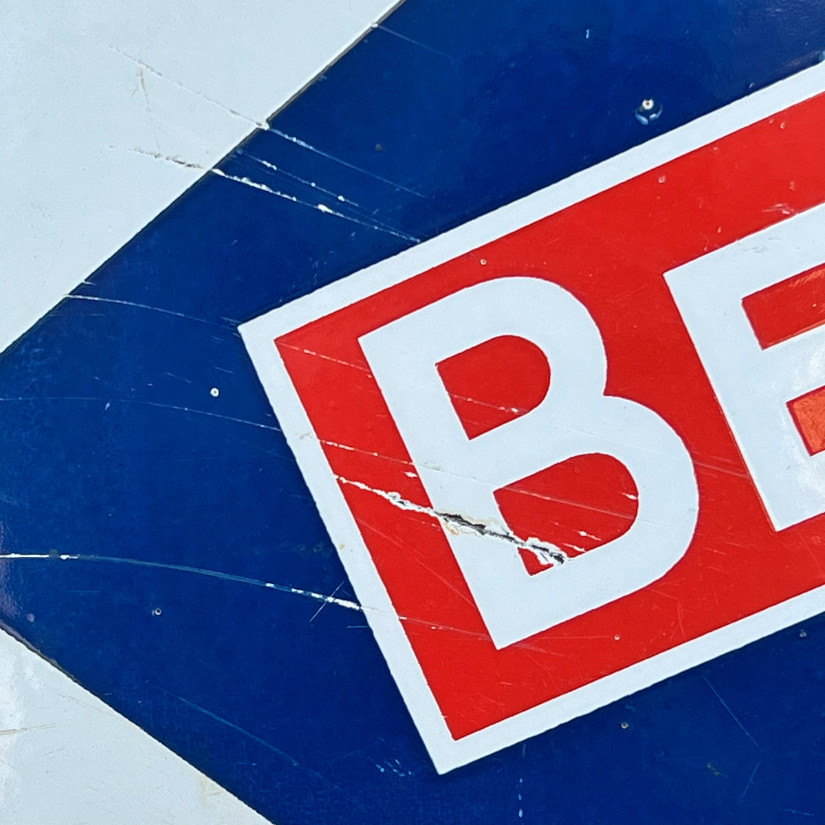 Advertising - a French double sided pictorial flanged enamel advertising sign, Berrogaz