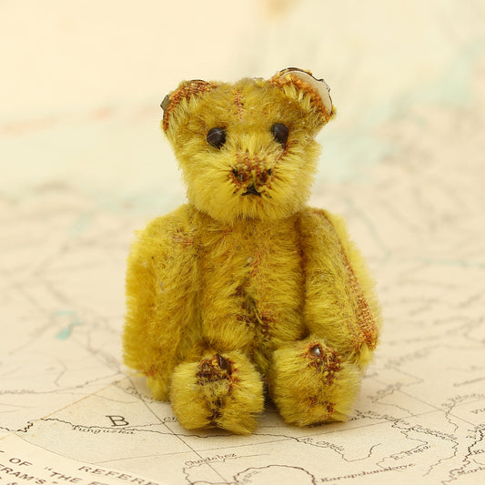 Toys & Juvenalia - a Schuco (Germany) miniature golden mohair jointed teddy bear, c.1930