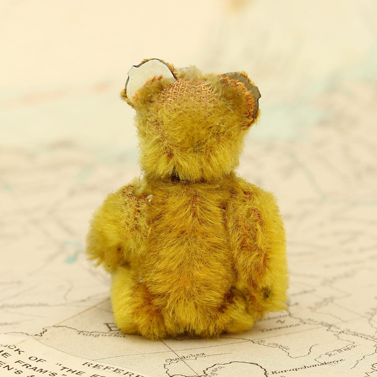 Toys & Juvenalia - a Schuco (Germany) miniature golden mohair jointed teddy bear, c.1930