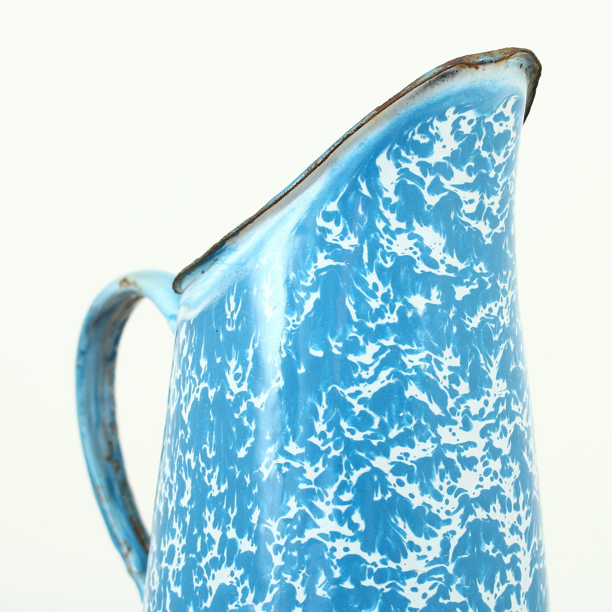 A vintage French blue and white marbled pattern enamel pitcher jug, 24cm high